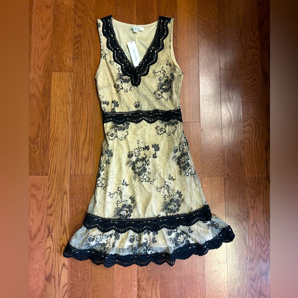 Francesca’s antique look lace dress. Black and cream color. Size XXS